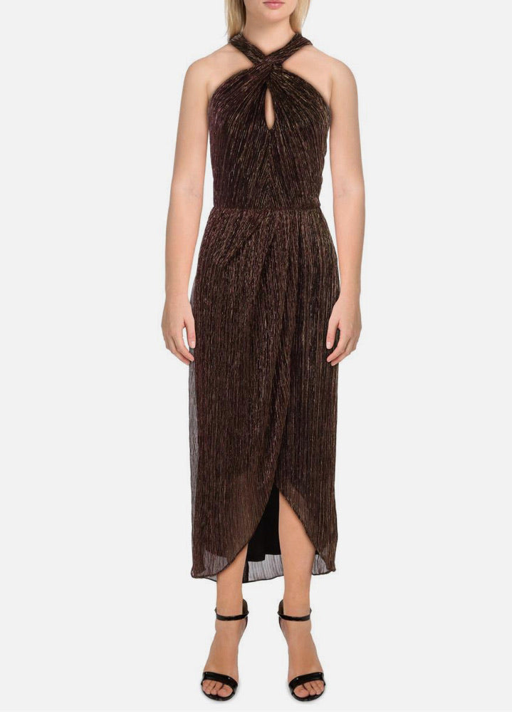 Woman wearing a brown halter neck dress on a white background