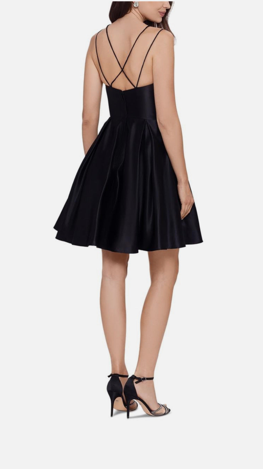 Black dress with thin straps on a white background