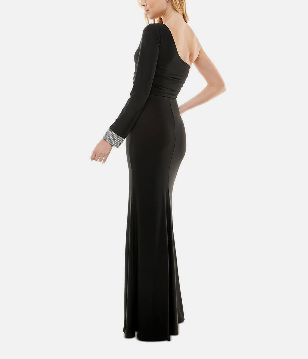 Black evening gown with long sleeves on a white background