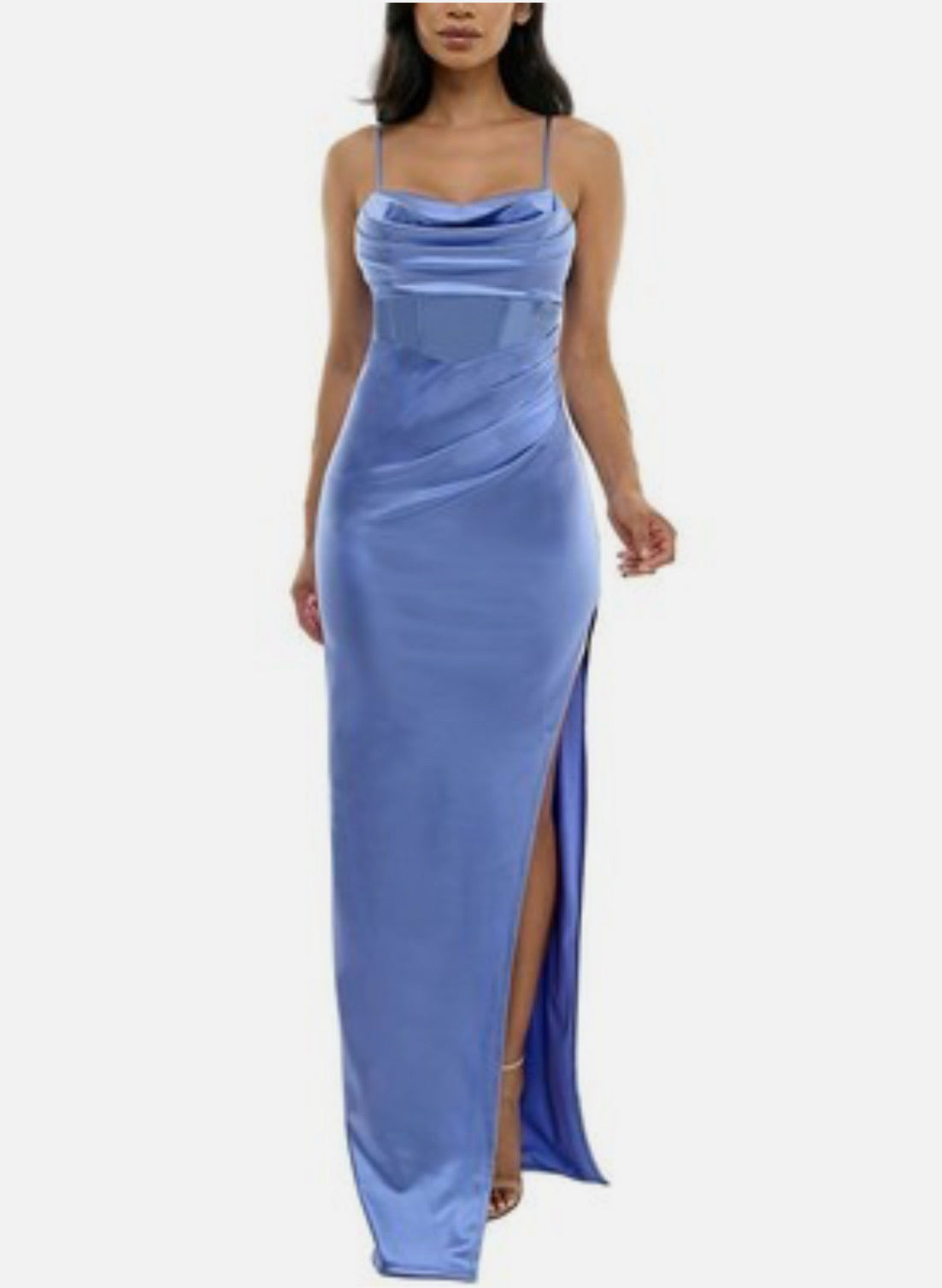 Blue evening gown with a slit on a white background