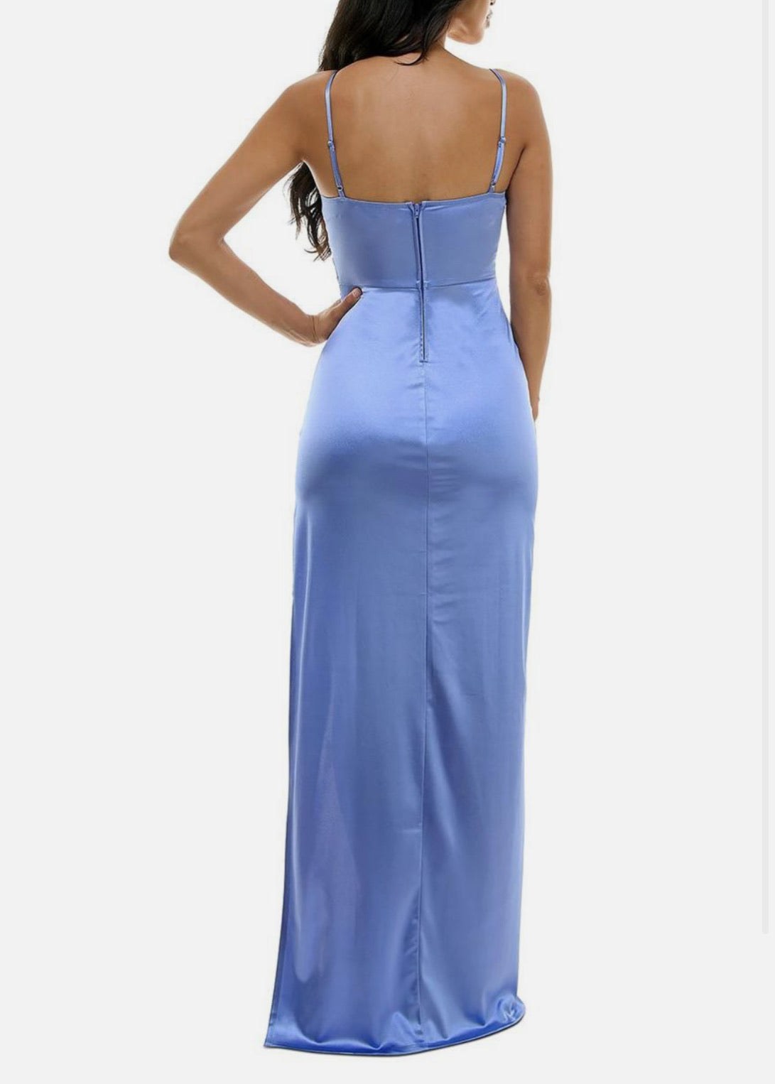 Woman wearing a blue evening gown on a white background