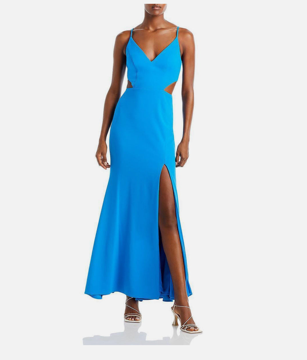 Blue evening gown with cut-out design on a white background