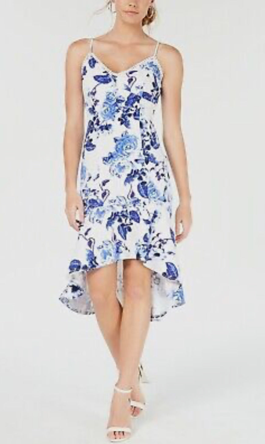 Woman wearing a floral dress on a white background